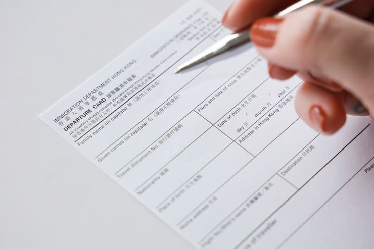 departure card at the immigration checkpoint at the airport